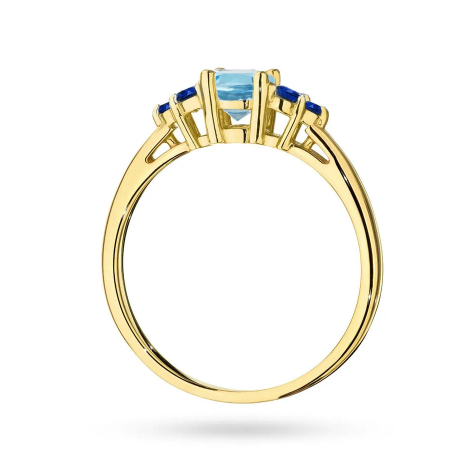 Gold 14k(585) ring with 0,50ct topaz with 6 sapphires. Perfect for a gift.