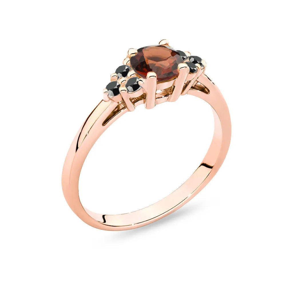 Ring aus Roségold 14 Karat (585) mit 0,60 ct Granat und 6 schwarzen Diamanten. Perfekt als Geschenk.