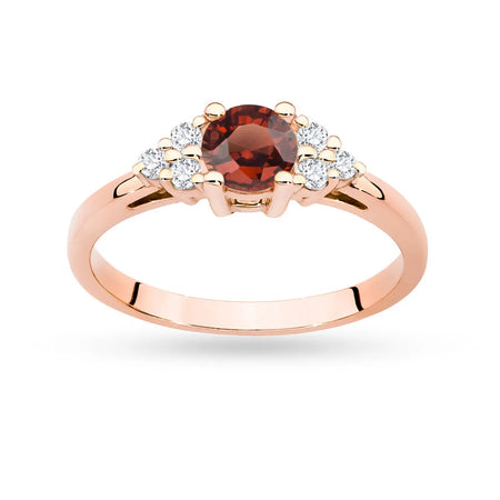Ring aus 14 Karat (585) Roségold mit 0,60 ct Granat und 6 Diamanten. Perfekt als Geschenk.