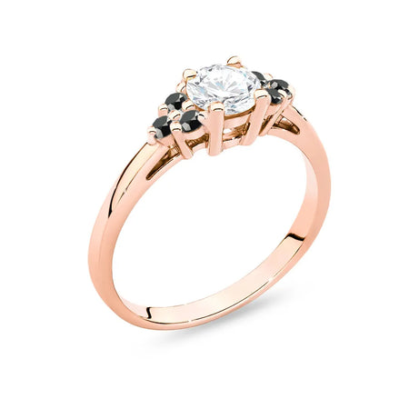 Ring aus 14 Karat (585) Roségold mit 0,60 ct weißem Saphir und 6 schwarzen Diamanten. Perfekt als Geschenk.