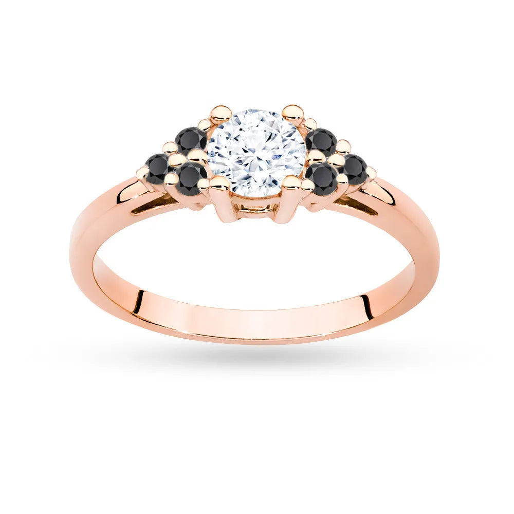 Ring aus 14 Karat (585) Roségold mit 0,60 ct weißem Saphir und 6 schwarzen Diamanten. Perfekt als Geschenk.