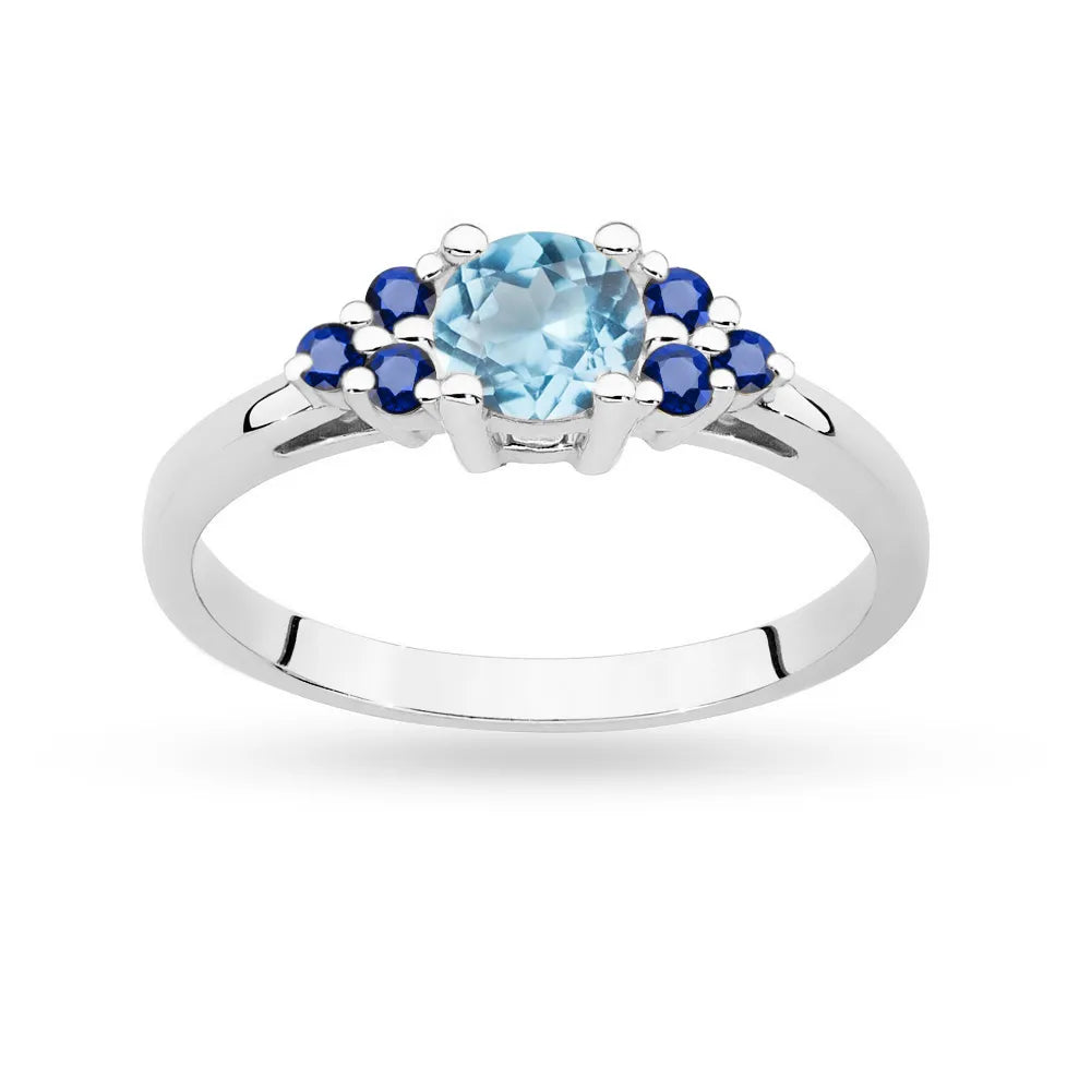 Ring aus 14-karätigem (585) Weißgold mit 0,50 ct Topas und 6 Saphiren. Perfekt als Geschenk.