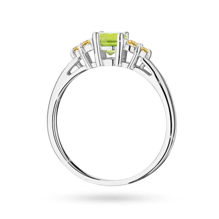 Ring aus 14-karätigem (585) Weißgold mit 0,60 ct Olivin und 6 bronzefarbenen Diamanten. Perfekt als Geschenk.