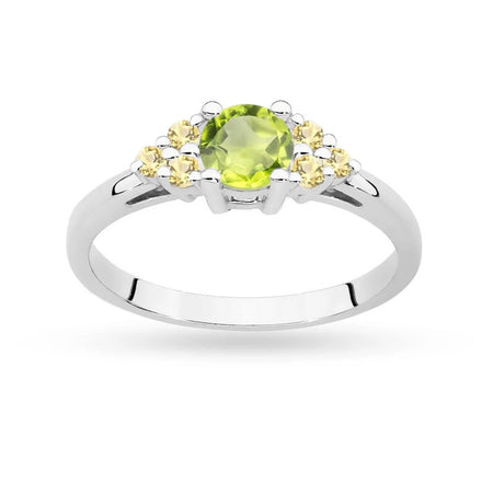 Ring aus 14-karätigem (585) Weißgold mit 0,60 ct Olivin und 6 bronzefarbenen Diamanten. Perfekt als Geschenk.