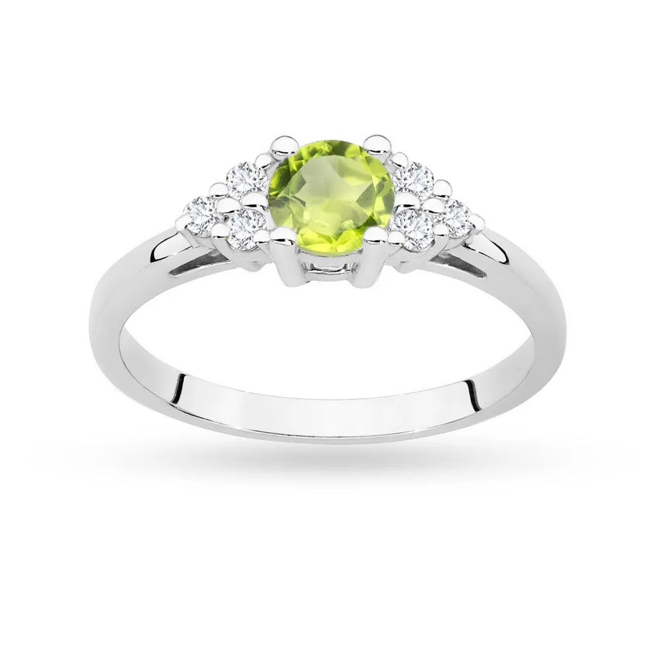 White Gold 14k(585) ring with 0,60ct olivine with 6 diamonds. Perfect for a gift.