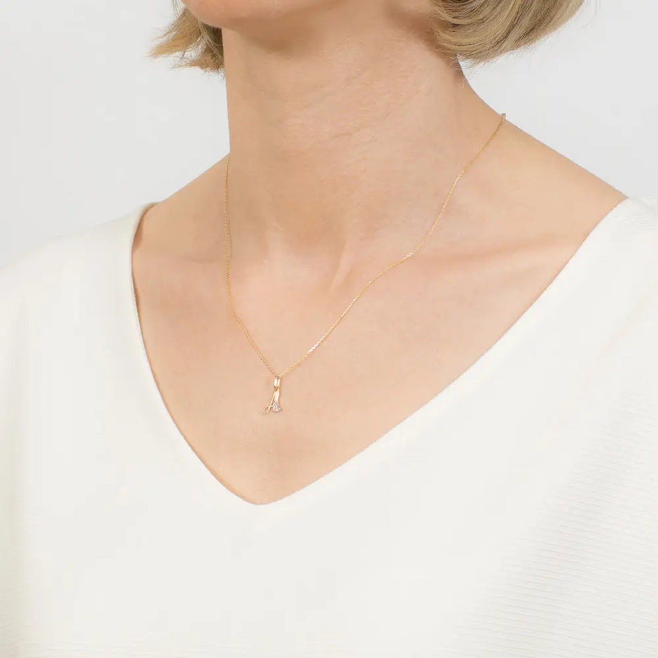 Gold pendant with a sparkling zirconia letter “A”. Crafted from high-quality 585 yellow gold (14 carat)