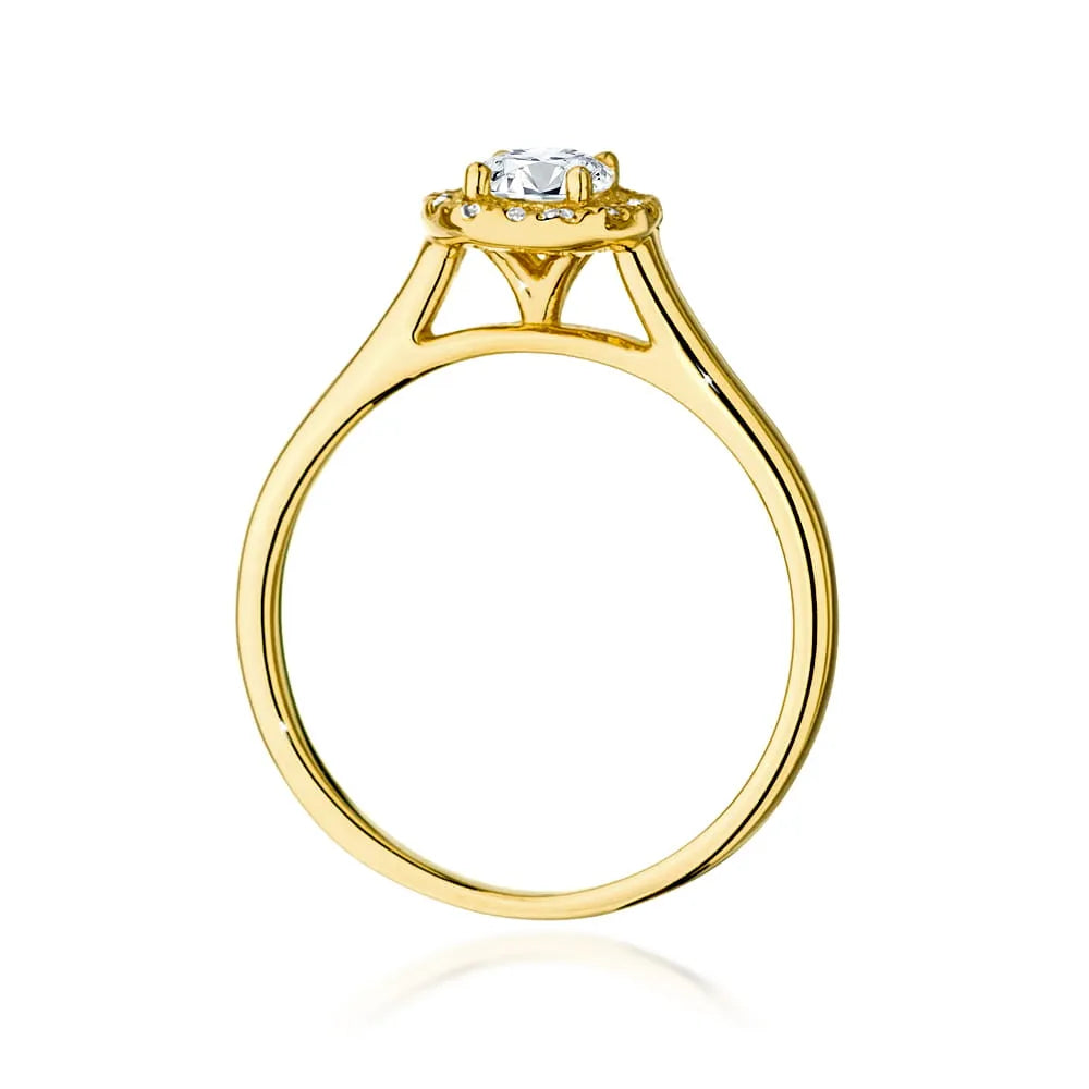 Gold 14k(585) ring with 0,40ct diamond and side diamonds 0,12ct.  Perfect for a gift.