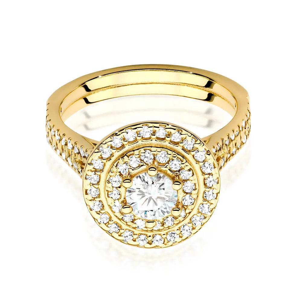 Ohrstecker aus 14-karätigem Gold (585) mit einem 0,40 ct Diamanten und seitlich verlaufenden 0,613 ct Diamanten. Verpackt in einer eleganten Schachtel, die sich hervorragend als Geschenk eignet.
