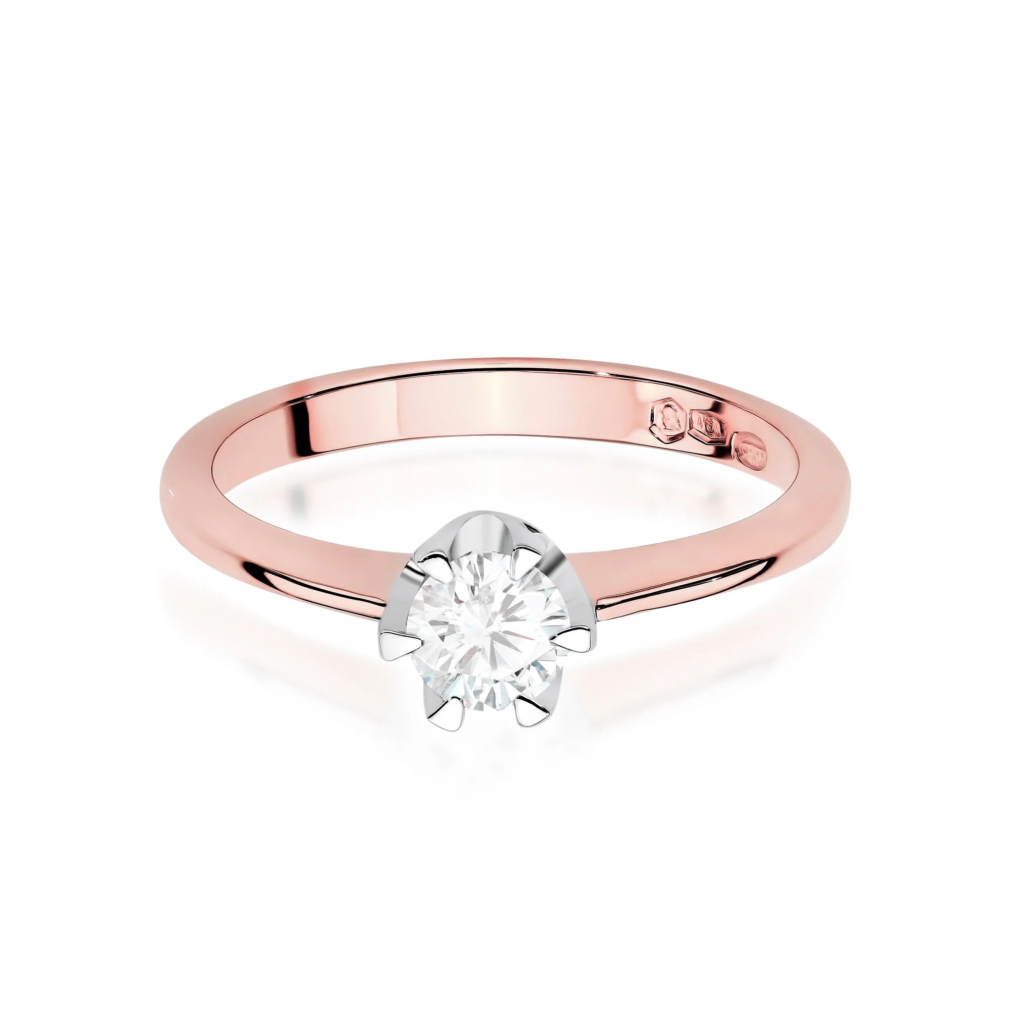 Rose Gold 14k(585) ring with 0,50ct diamond.  Is packaged in an elegant box, which is perfect for a gift.