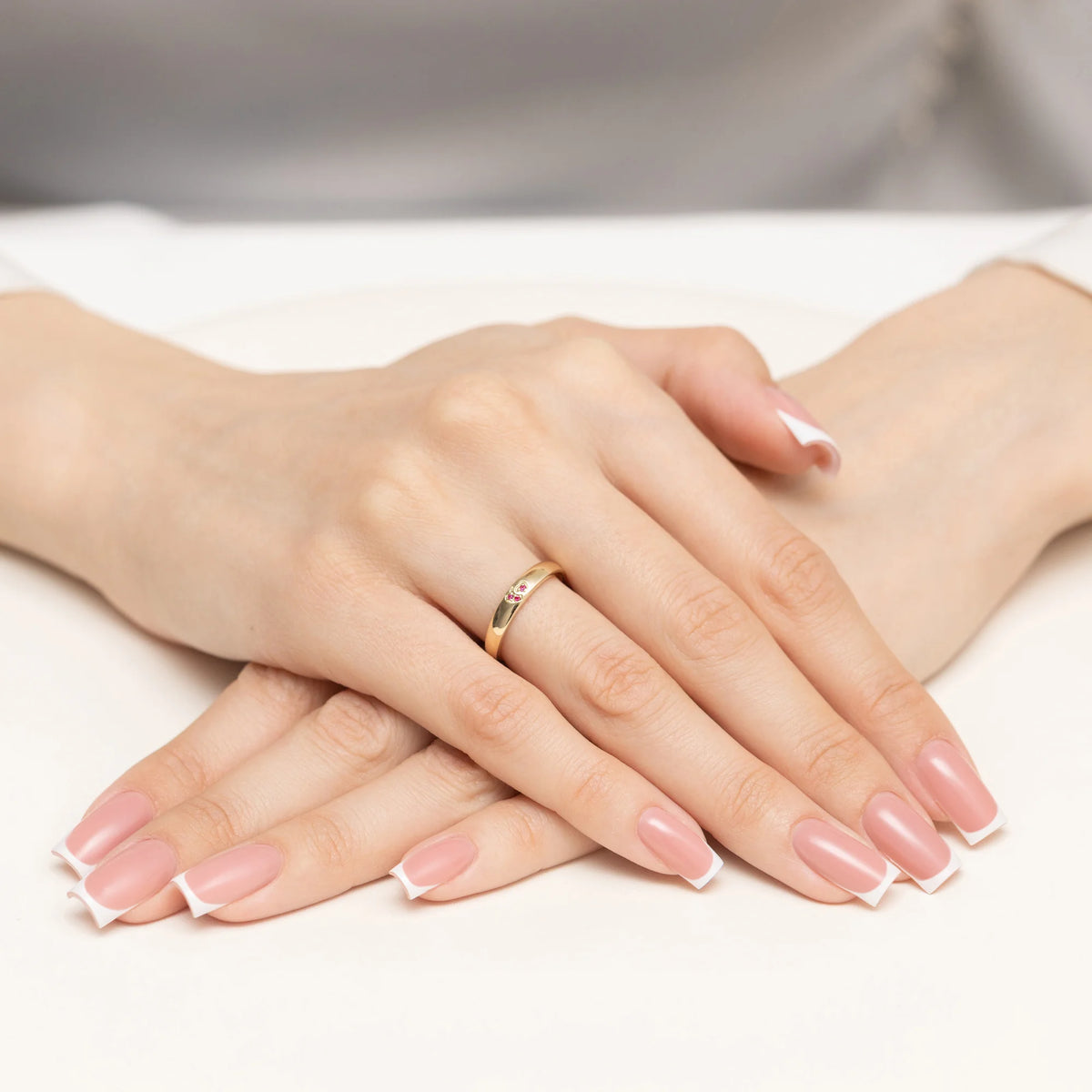 14k gold ring with 2 red zirconia hearts. Classic design with modern twist. Packed in black box, paper, and gift bag.