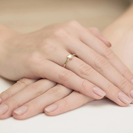 14k gold ring with 0.015ct diamonds. Packaged in an black box, paper and a gift bag.
