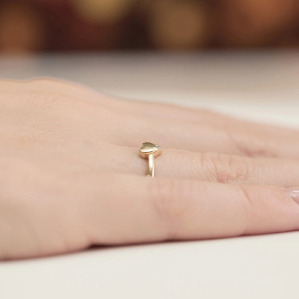 14k gold ring with 0.015ct diamonds. Packaged in an black box, paper and a gift bag.