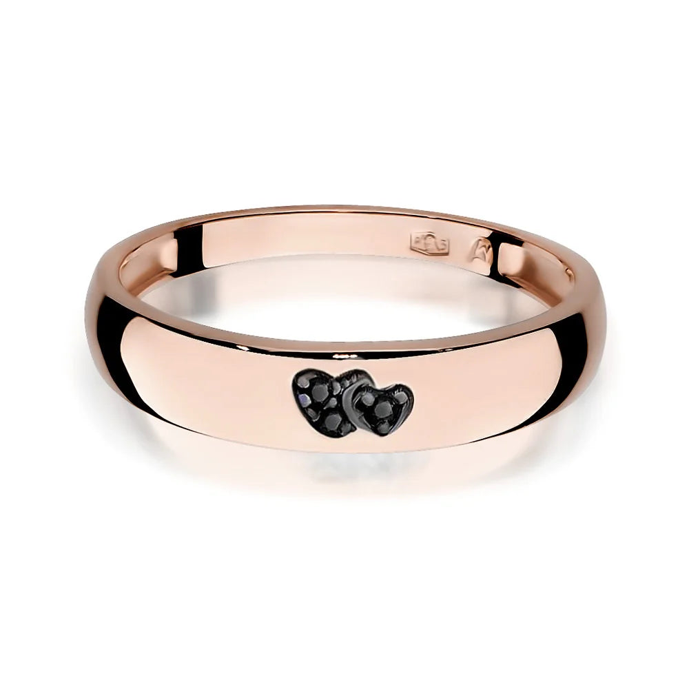 14k rose gold ring with 2 black zirconia hearts. Classic design with modern twist. Packed in black box, paper, and gift bag.