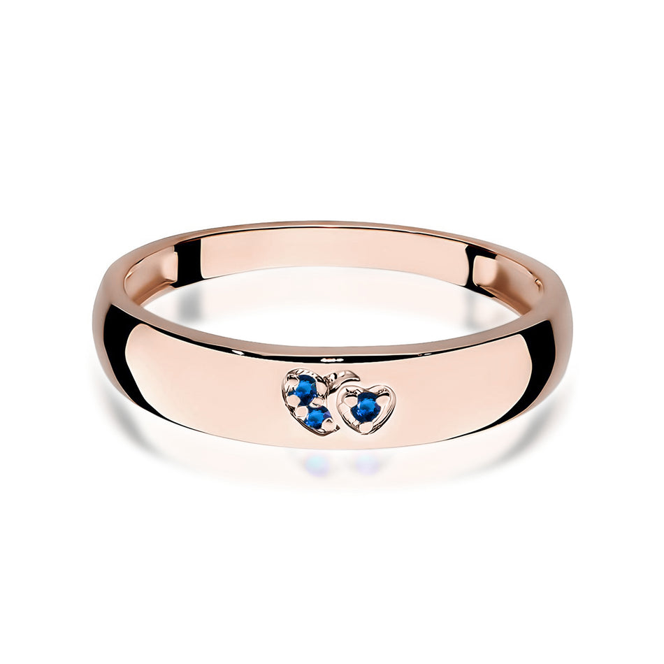 14k rose gold ring with 2 blue zirconia hearts. Classic design with modern twist. Packed in black box, paper, and gift bag.