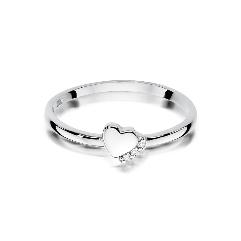 Ring aus 14 Karat Weißgold mit 0,015 Karat Diamanten. Verpackt in einer schwarzen Schachtel, Papier und einer Geschenktüte.