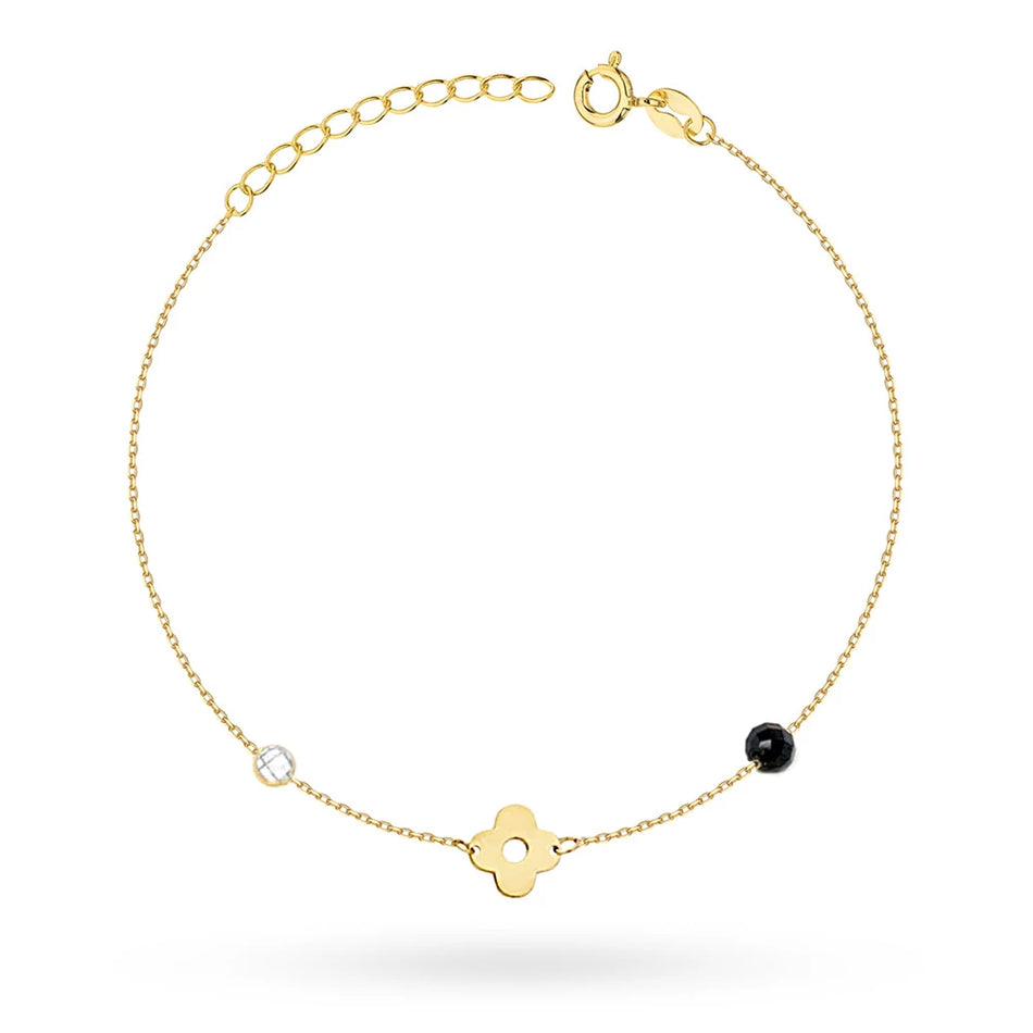 Gold bracelet with wide paperclip anchor links and engraved heart charm