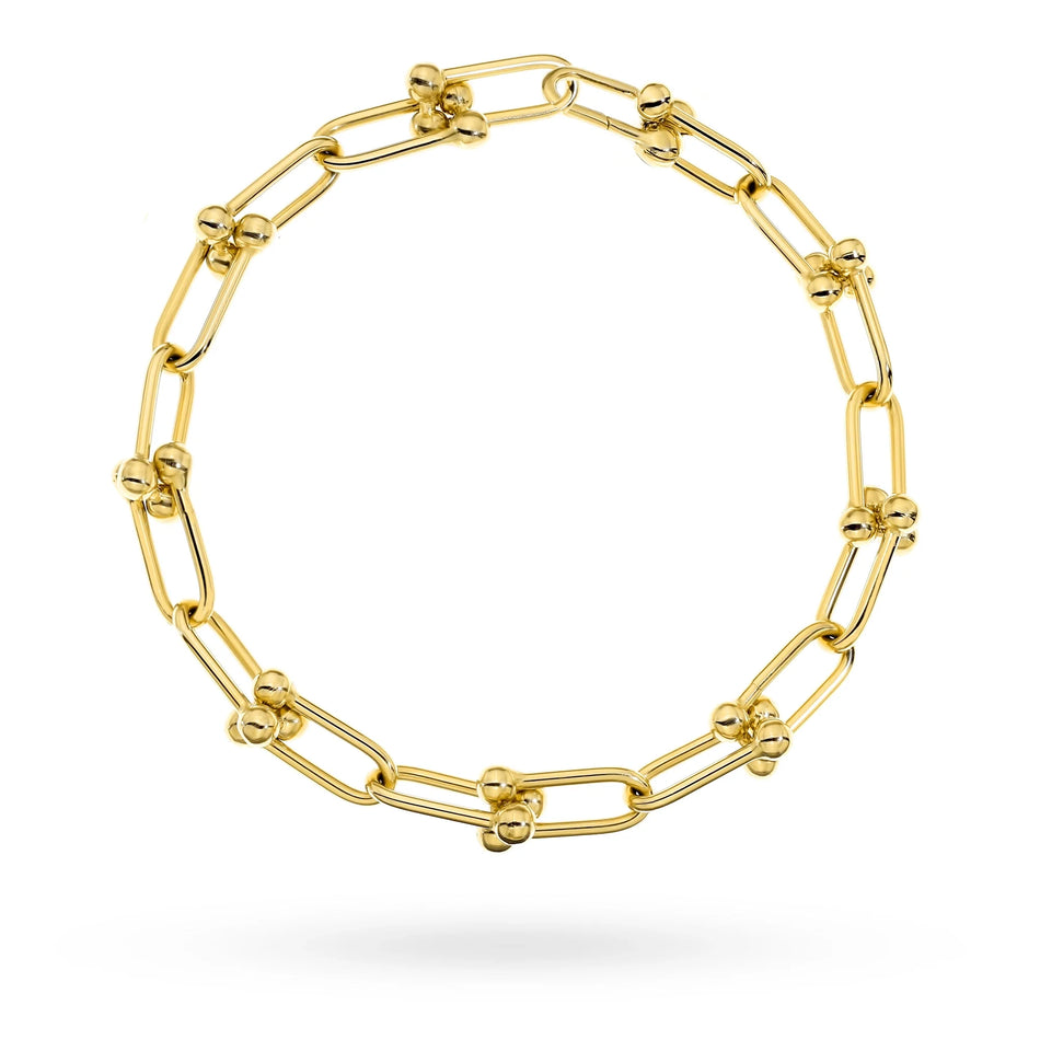 Goldenes breites Armband mit Gliedern und Perlen