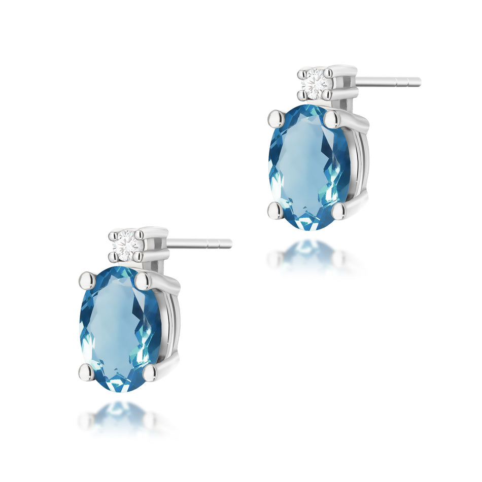 White Gold Earrings with 0.50 ct Topaz London Blue and 0.029 ct Diamonds | 585 (14k) White Gold Stud Earrings