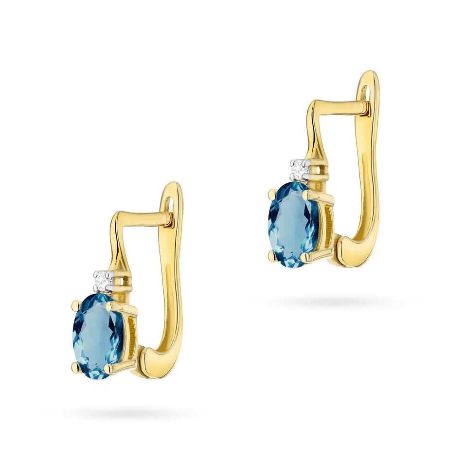 Goldohrringe mit 0,50 ct Topas London Blue und Diamanten