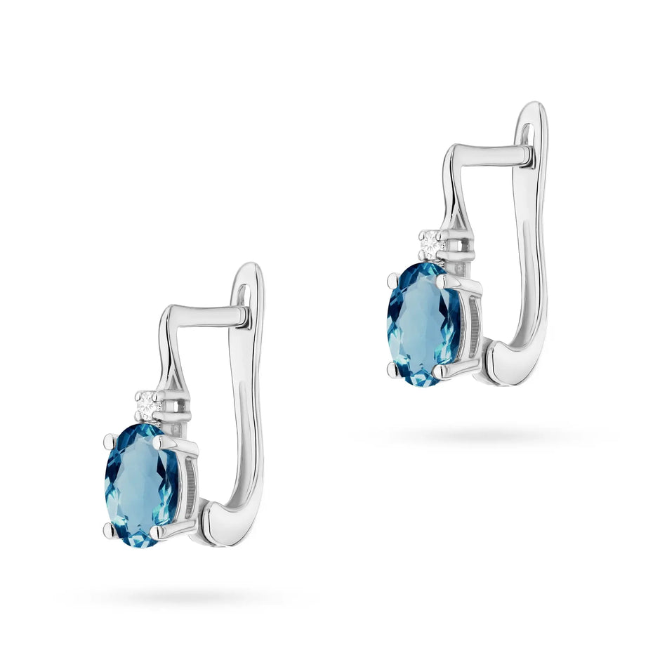 Goldohrringe mit 0,50 ct Topas London Blue und Diamanten