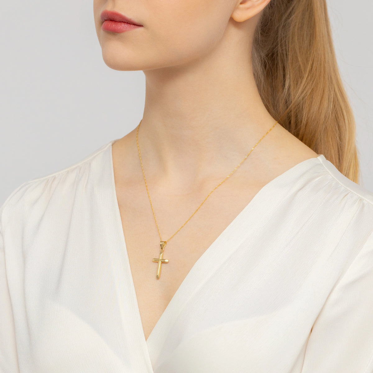 goldenes Kreuzanhänger mit Zirkonia kr-gw-071-585