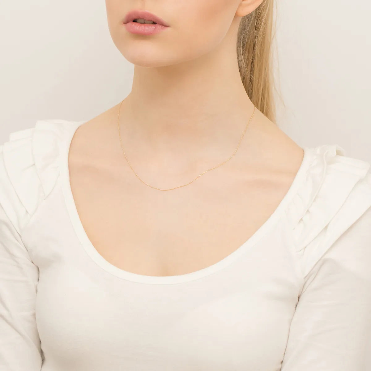 gold-curb-chain-0-7mm-l036-585