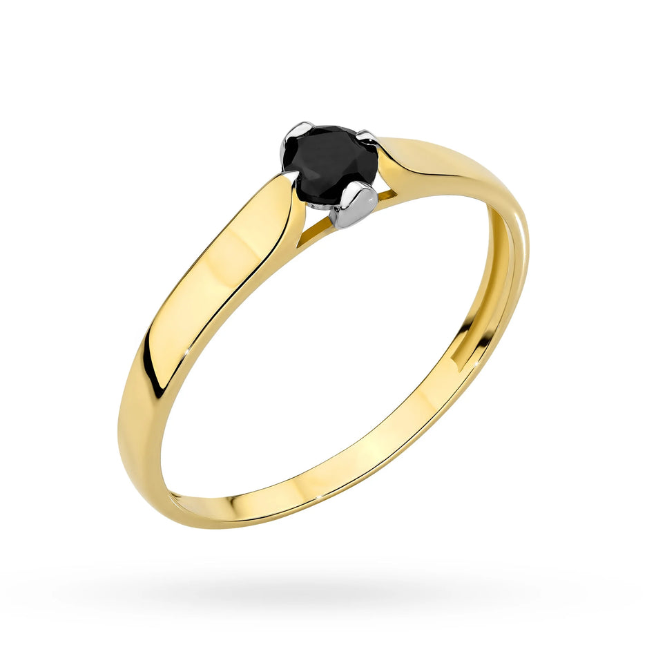 Two-tone gold ring with black stone