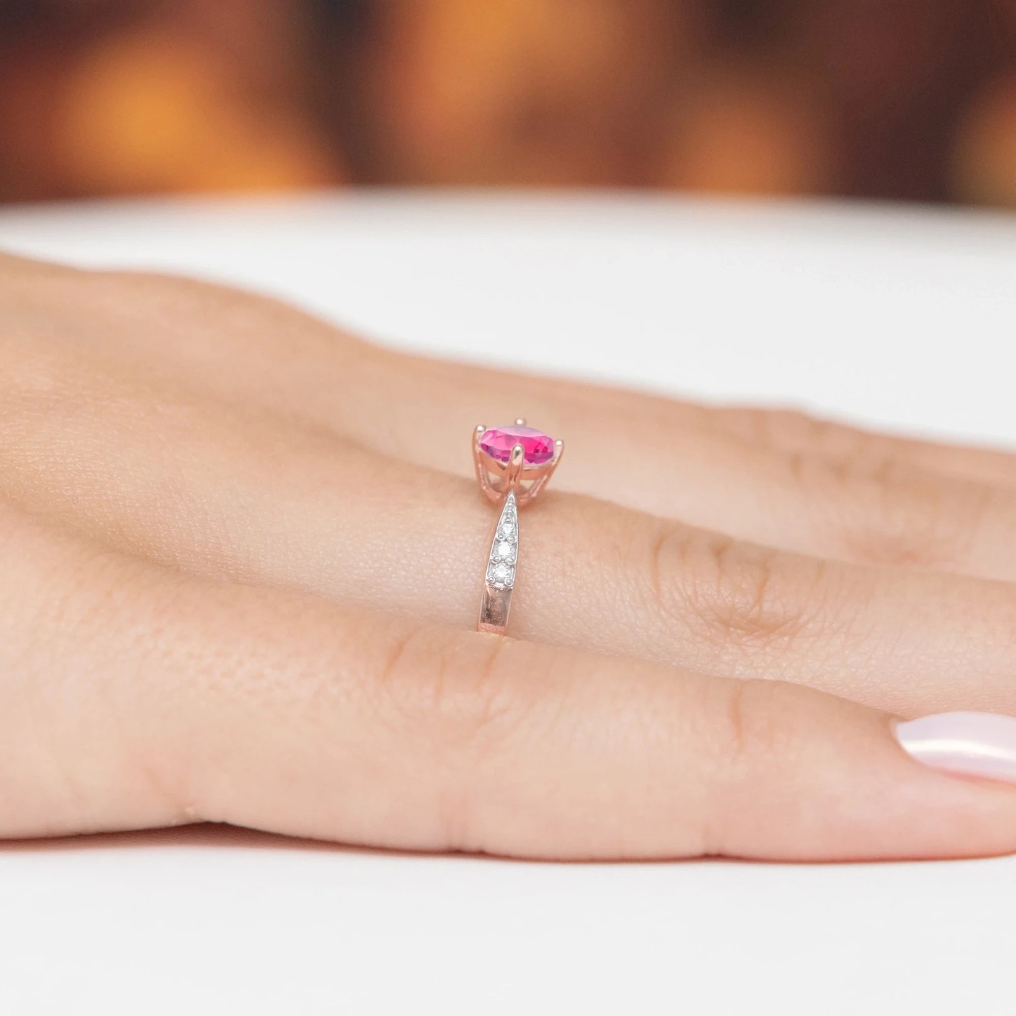 gold-ring-with-0-60ct-pink-topaz-and-0-068ct-diamonds-p167-585-rt0-60