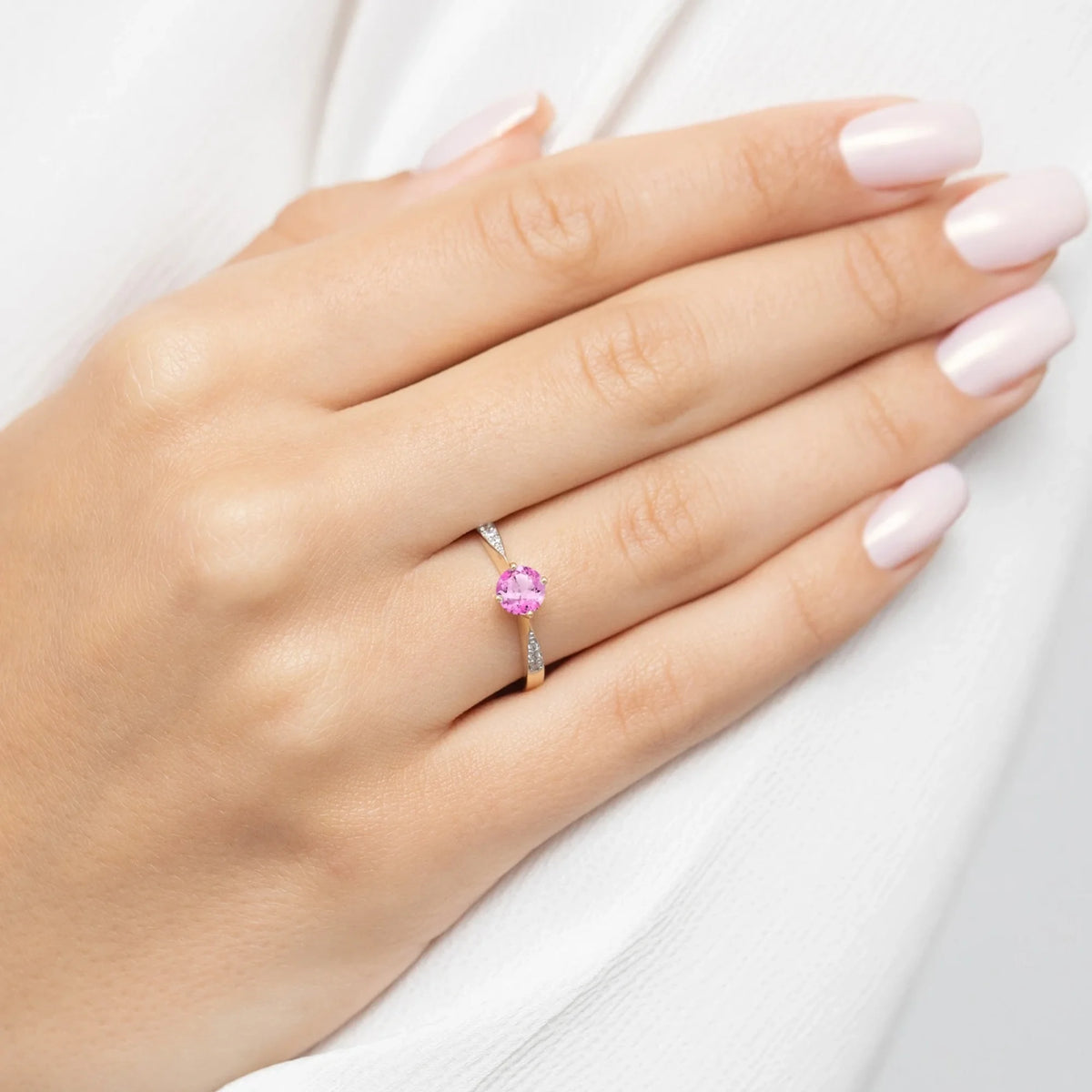 goldring-mit-0-60ct-rosa-topas-und-0-068ct-diamanten-p167-585-rt0-60