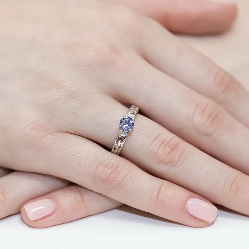 gold-ring-with-0-50ct-tansanit-and-0-02ct-diamonds-w0014-tap-01