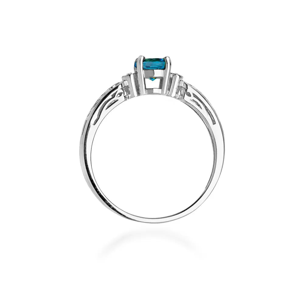 goldring-mit-0-50ct-topas-london-blau-und-0-02ct-diamanten-w0014-tol-01