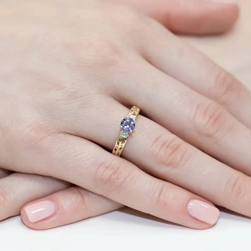 goldring-mit-0-50ct-tansanit-und-0-02ct-diamanten-w0014-tip-01