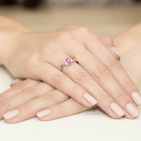 gold-ring-with-0-50ct-pink-topaz-and-0-052ct-diamonds-w0019-top-01