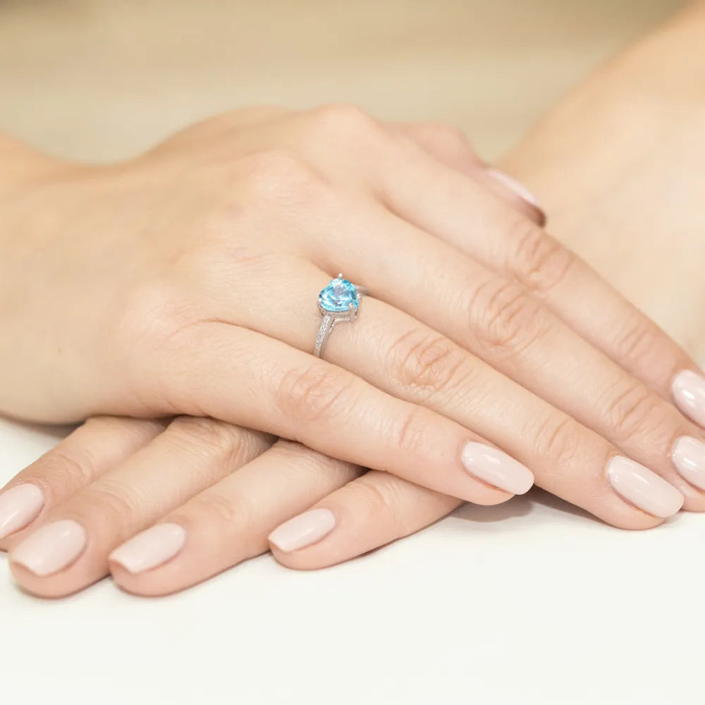 goldring-mit-1-20ct-topas-und-0-04ct-diamanten-w0031-tob-01