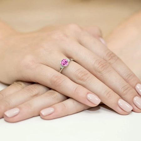 gold-ring-with-1-10ct-pink-topaz-and-0-01ct-diamonds-w0040-top-01