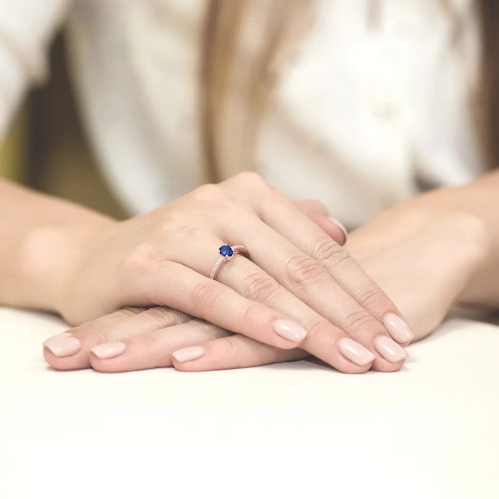 gold-ring-with-0-70ct-sapphire-and-0-05ct-diamonds-w0067-sab-01