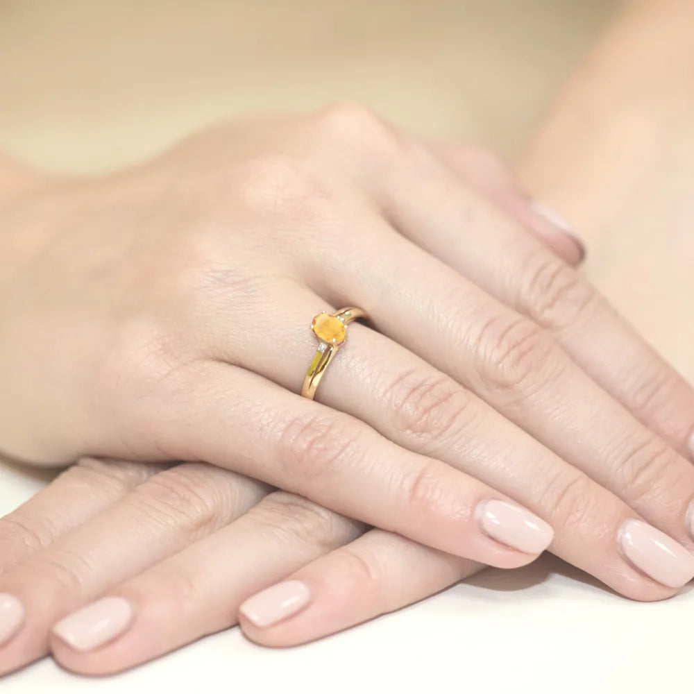 goldring-mit-0-60ct-citrin-und-0-029ct-diamanten-w0068-ciy-01