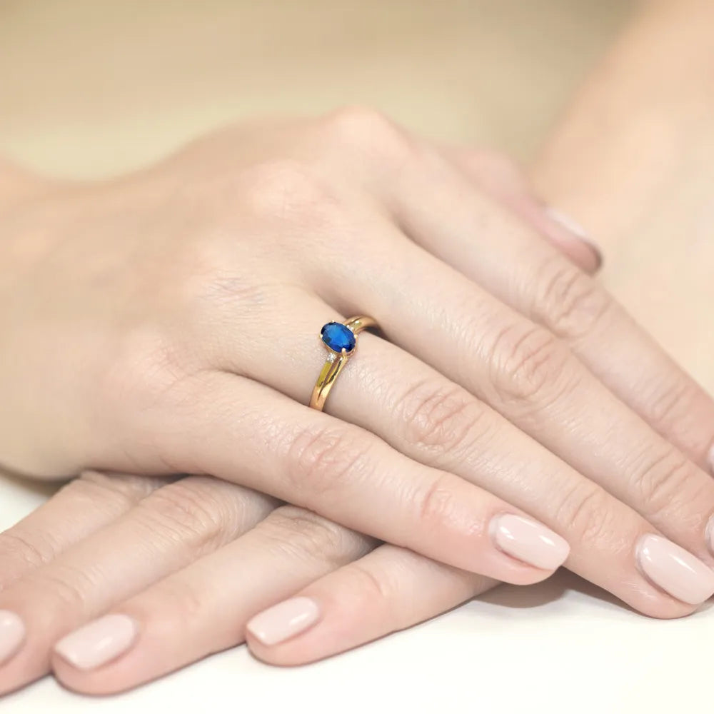 gold-ring-with-0-70ct-sapphire-and-0-029ct-diamonds-w0068-sab-01