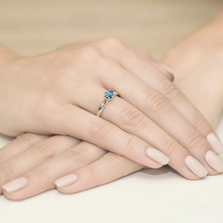 goldring-mit-0-50ct-topas-london-blau-und-0-01ct-diamanten-w0074-tol-01