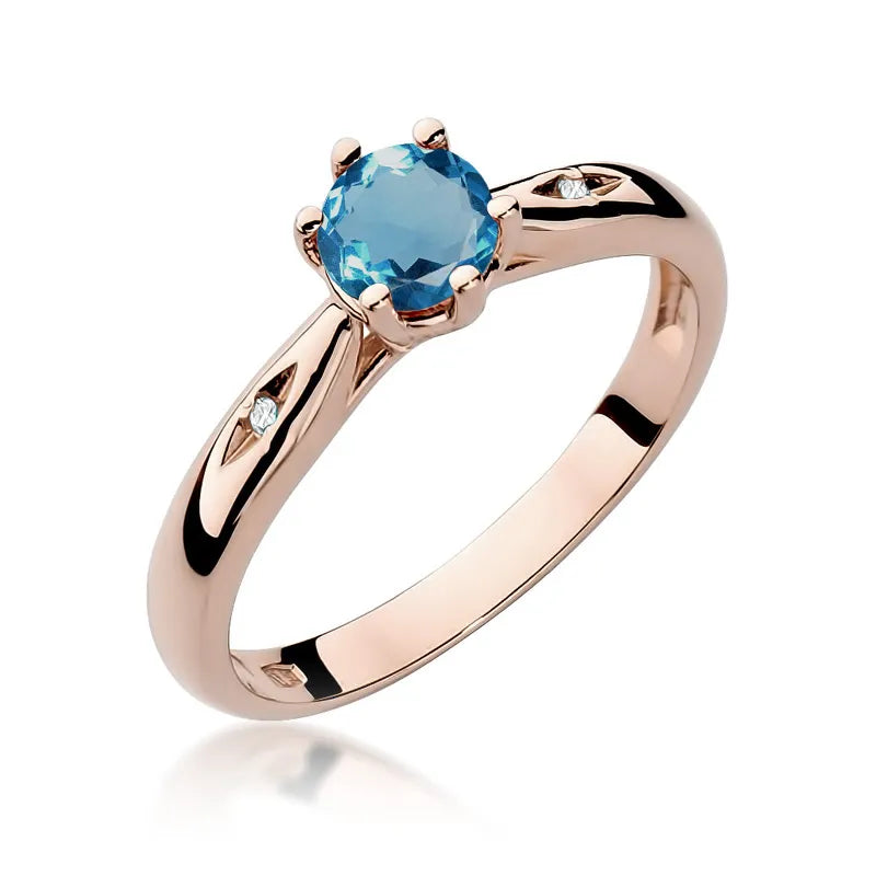 gold-ring-with-0-50ct-topaz-london-blue-and-0-01ct-diamonds-w0074-tol-01