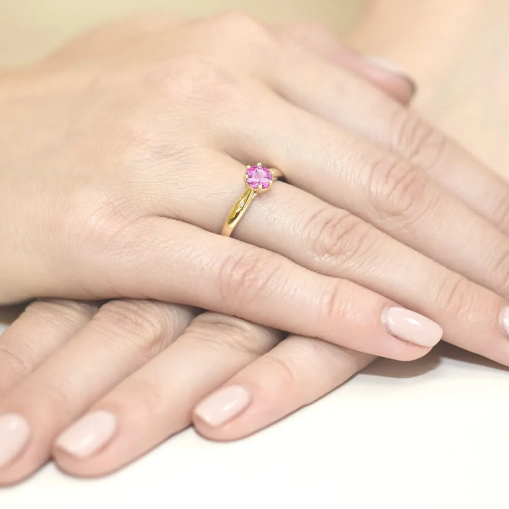 gold-ring-with-0-60ct-pink-topaz-and-0-01ct-diamonds-w0074-top-01