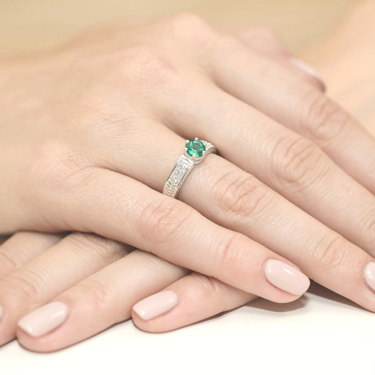 gold-ring-with-0-50ct-emerald-and-diamonds-w0075-emg-01