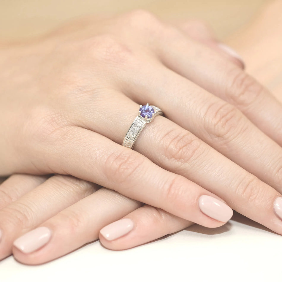 goldring-mit-0-50ct-tansanit-und-diamanten-w0075-tap-01