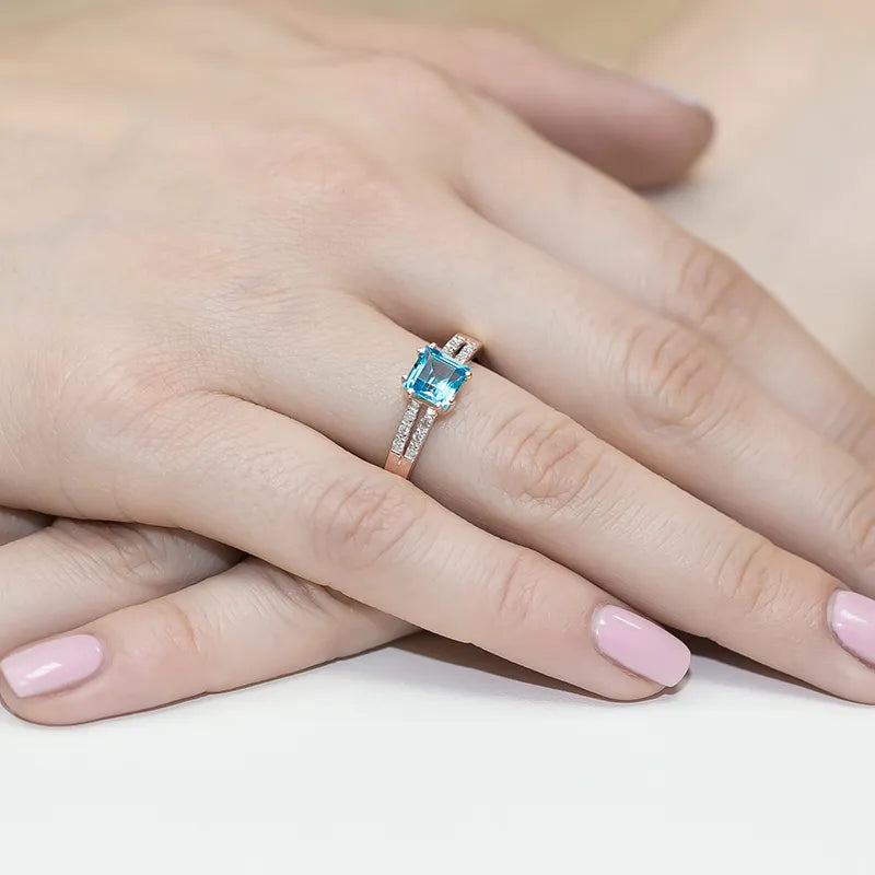 gold-ring-with-1-10ct-topaz-and-0-06ct-diamonds-w0079-tob-01