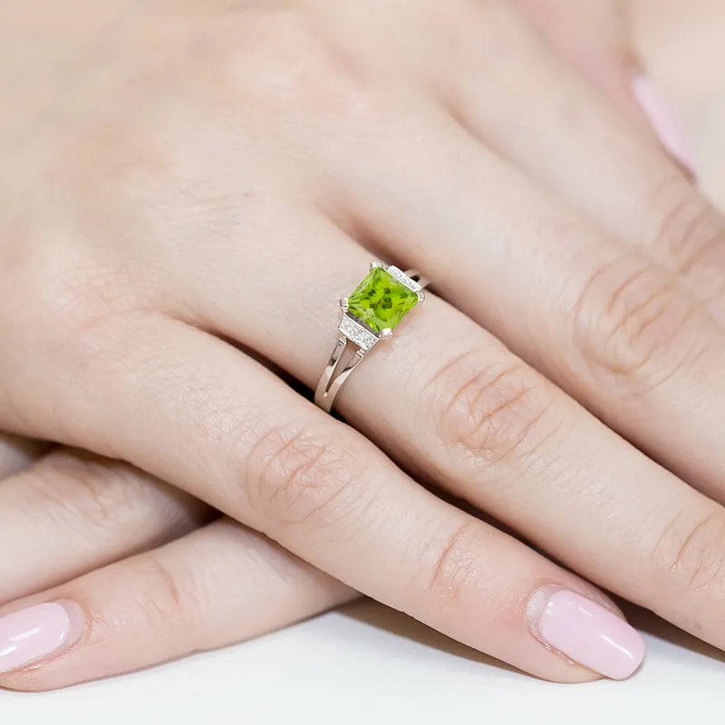 goldring-mit-1-10ct-olivin-und-0-03ct-diamanten-w0103-peg-01