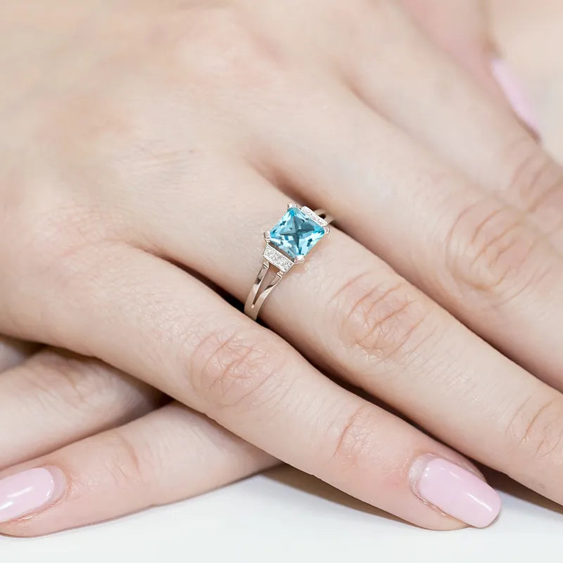 goldring-mit-1-40ct-topas-und-0-03ct-diamanten-w0103-tob-01
