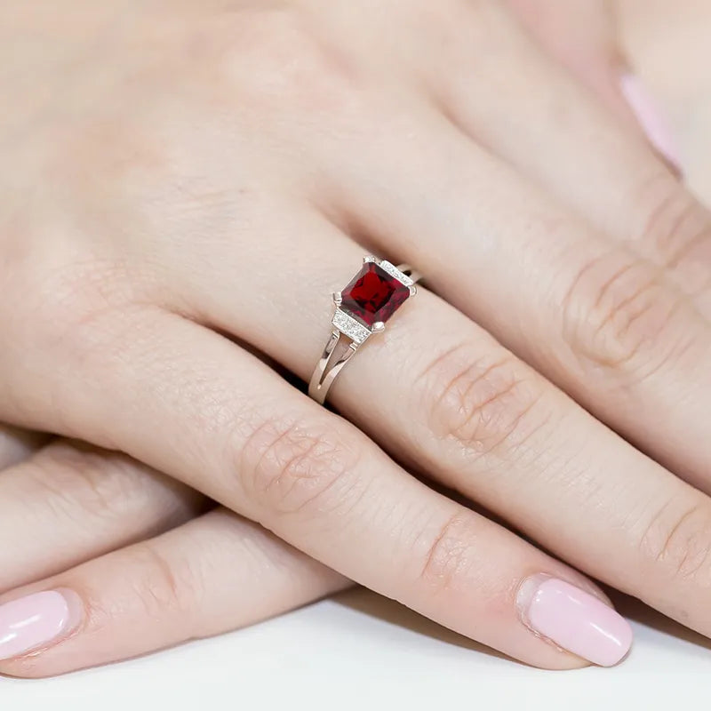 goldring-mit-1-30ct-granat-und-0-03ct-diamanten-w0103-gar-01