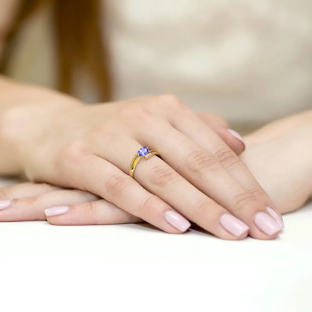 gold-ring-with-0-40ct-tansanit-and-0-052ct-diamonds-w0119-tap-01