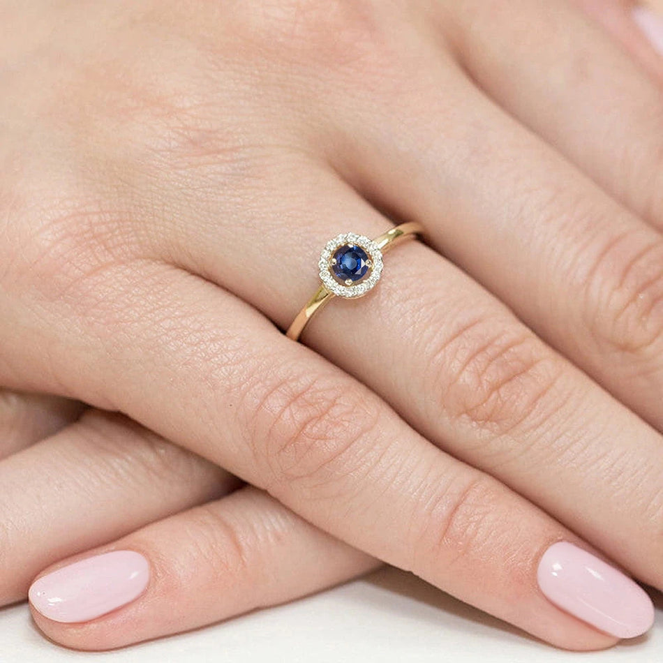 Goldring mit 0,15 ct Saphir und 0,08 ct Diamanten