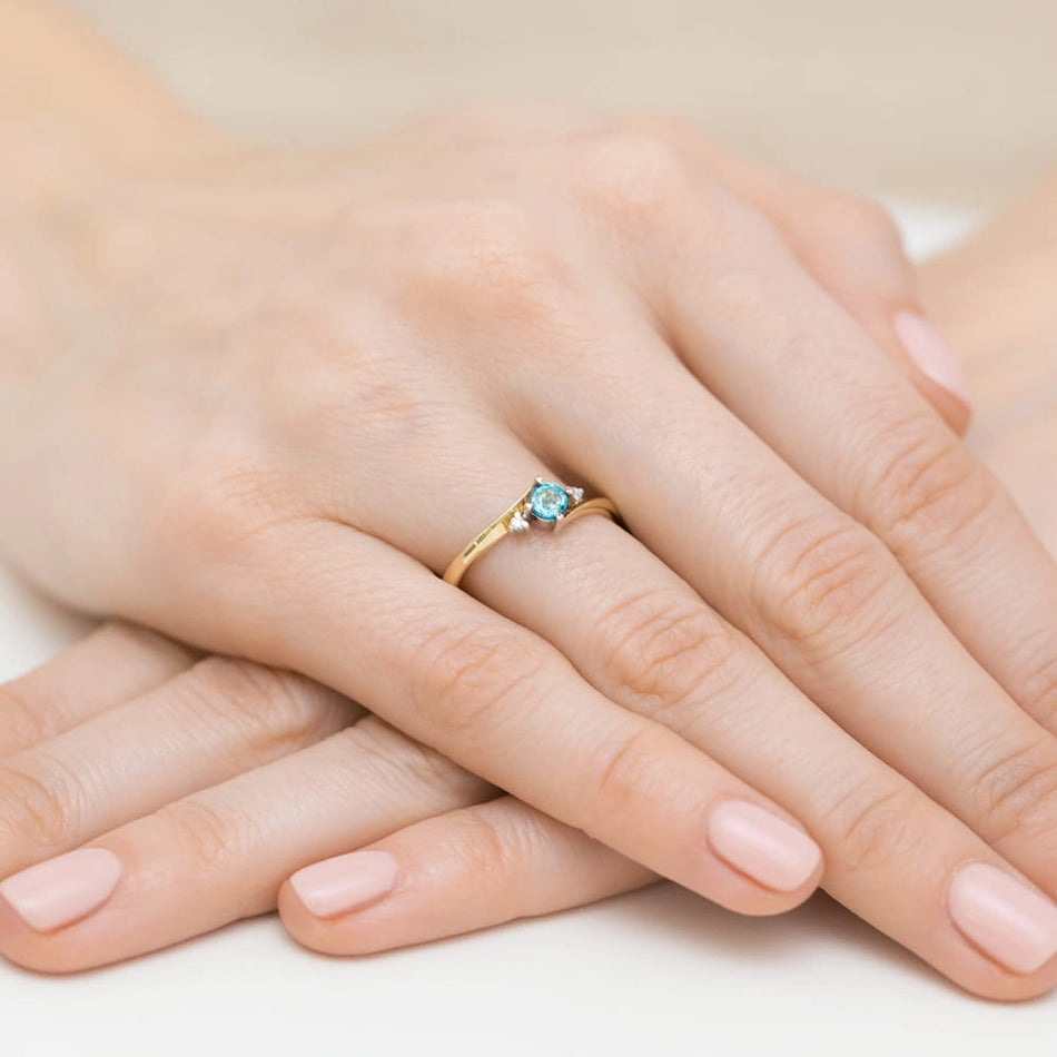 Gold Ring with Topaz and Diamonds